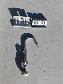 Guidovie e ganci per trasporto carni