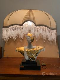 Lampada Carpié con figura di donna stilizzata fira