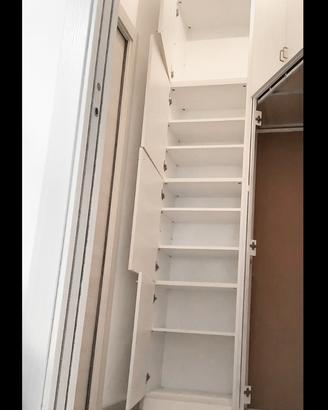 Armadio bianco alto 287 cm con scaffali 290 / 280