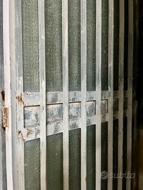 Porta in ferro con vetrata per garage