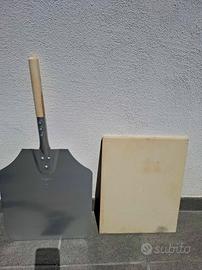 Pala e pietra refrattaria per pizza