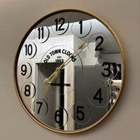 Orologio da parete a specchio