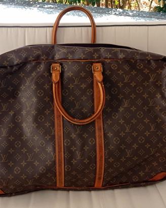 valigia Louise Vuitton