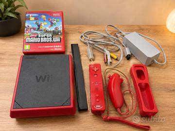 Wii mini con accessori + new super mario bros. Wii