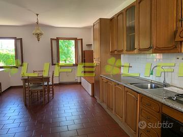 Villetta a schiera con giardino e garage