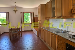 Villetta a schiera con giardino e garage