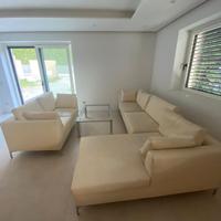 Divani Rizzetto in ecopelle color crema con peniso