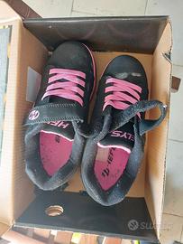 scarpe con rotelle heelys
