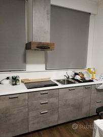 cucina artigianale con piano in corian