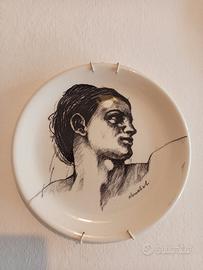 coppia di piatti decorarivi