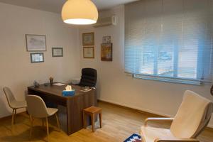 Stanza in ufficio condiviso per professionisti