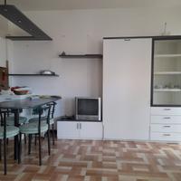 arredamento soggiorno/pranzo con letto a scomparsa