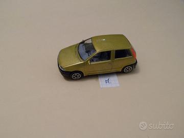 BURAGO FIAT PUNTO 1°S. SCALA 1:43 COLORE ORO-BLU