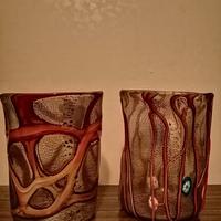 Coppia di bicchieri in vetro soffiato decorati