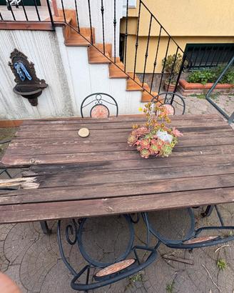 Tavalo da giardino con sei sedie  in ferro battuto