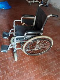 SEDIA A ROTELLE