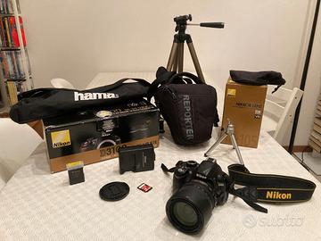 Nikon D3100 + Nikkor 18-105 AF-S DX VR + Accessori