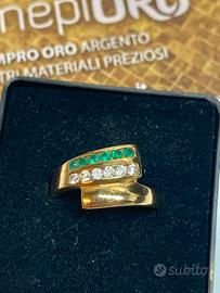 Anello oro giallo con zirconi