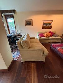 Coppia divani in tessuto di velluto a coste