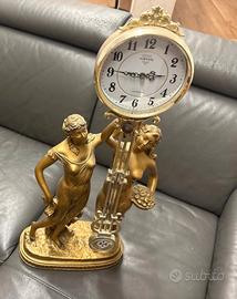 Orologio a pendolo statua