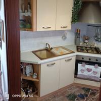 cucina completa di elettrodomestici ad angolo 