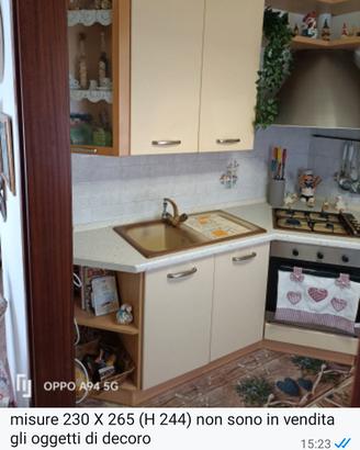 cucina completa di elettrodomestici ad angolo 