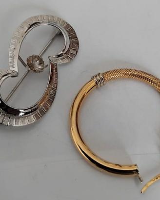 Orecchino e spilla in oro 750 