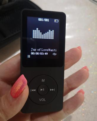 Lettore Mp3 e radio + banda braccio