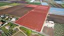 terreno-agricolo-7-ha-fronte-strada-con-magazzino