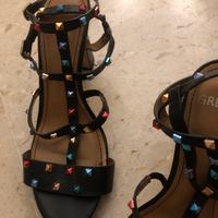 Sandali vero cuoio tacco medio alto con borghie