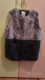 Ecopelliccia smanicata grigia e nera per bambina.