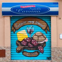 Insegna luminosa con pannello sostituibile