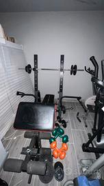 Panca per addominali con Bilanciere e pesi