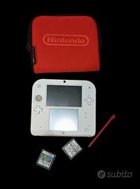 Nintendo 2ds bianco e rosso con giochi