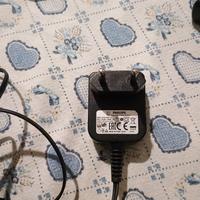 caricabatterie Philips scopa elettrica 