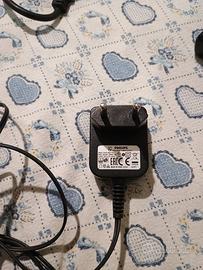 caricabatterie Philips scopa elettrica 
