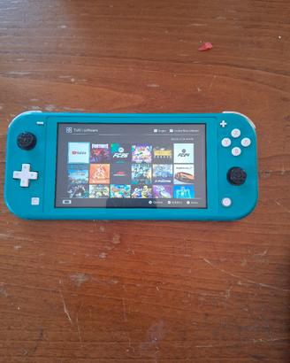 nintendo switch lite turchese + 3 giochi fisici 