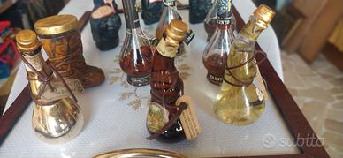 12 bottigliette  liquori mignon anni 80 ca.
