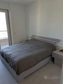 Letto- contenitore e comodini annessi