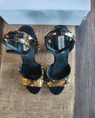 Scarpe donna in paillettes girabrilla nero/oro.