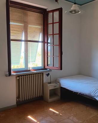 Stanze singole in grande appartamento a Marginone