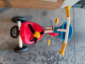 Triciclo con maniglia per spingerlo