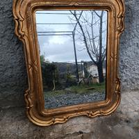 Specchio con cornice in legno