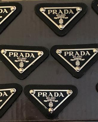 PRADA-Targhetta/ logo/badge/ spilla