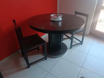 Arredamento soggiorno divano tavolo e sedie