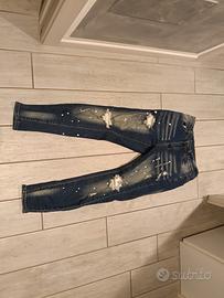Jeans Denin Skinny con strappi e effetto vernice 