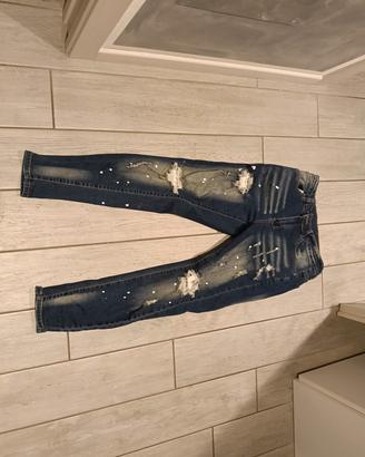 Jeans Denin Skinny con strappi e effetto vernice 