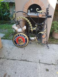 Insegna in ferro battuto