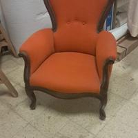 Poltrona con cornice in legno