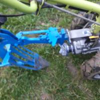 Aratro e  barra falciatrice grillo.